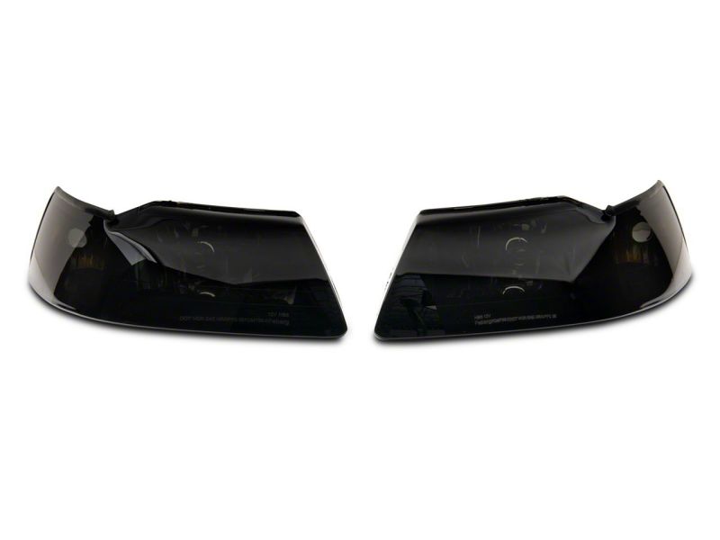 Raxiom 99-04 Ford Mustang Axial Series OEM Style Replacement Headlights- Blk Housing (Smoked Lens) Raxiom 99-04 Ford Mustang Axial Series OEM Style Replacement Headlights- Blk Housing (Smoked Lens)