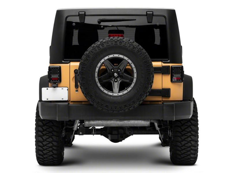 Raxiom 07-18 Jeep Wrangler JK Axial Series LED Tail Lights- Blk Housing (Clear Lens) Raxiom 07-18 Jeep Wrangler JK Axial Series LED Tail Lights- Blk Housing (Clear Lens)