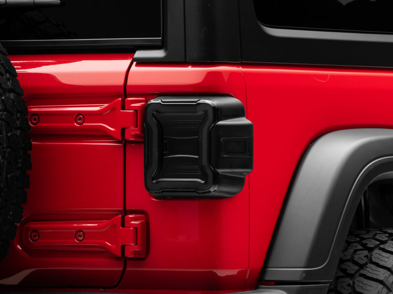 Raxiom 18-22 Jeep Wrangler JL LED Tail Lights- Black Housing (Smoked Lens) Raxiom 18-22 Jeep Wrangler JL LED Tail Lights- Black Housing (Smoked Lens)