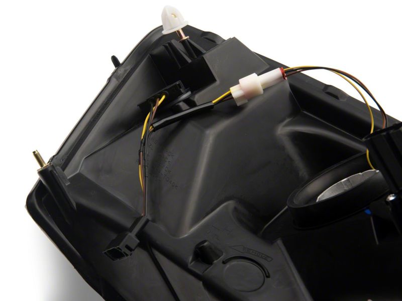 Raxiom 06-09 Dodge RAM 1500/2500/3500 Axial Headlights w/ SEQL LED Bar- Blk Housing (Clear Lens) Raxiom 06-09 Dodge RAM 1500/2500/3500 Axial Headlights w/ SEQL LED Bar- Blk Housing (Clear Lens)