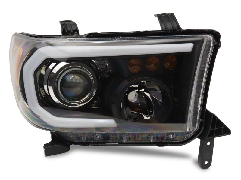 Raxiom 07-13 Toyota Tundra Axial Projector Headlights w/ SEQL LED Bar- Blk Housing (Clear Lens) Raxiom 07-13 Toyota Tundra Axial Projector Headlights w/ SEQL LED Bar- Blk Housing (Clear Lens)