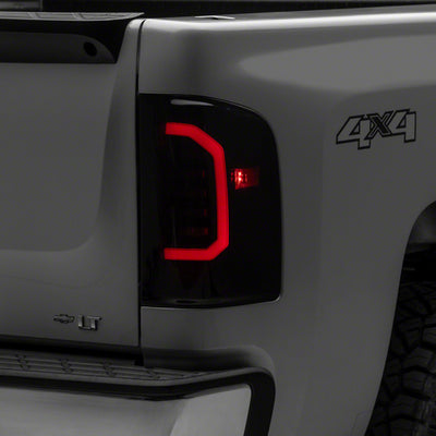 Raxiom 07-14 Chevrolet Silverado 1500 Axial Series LED Tail Lights- Blk Housing (Smoked Lens)
