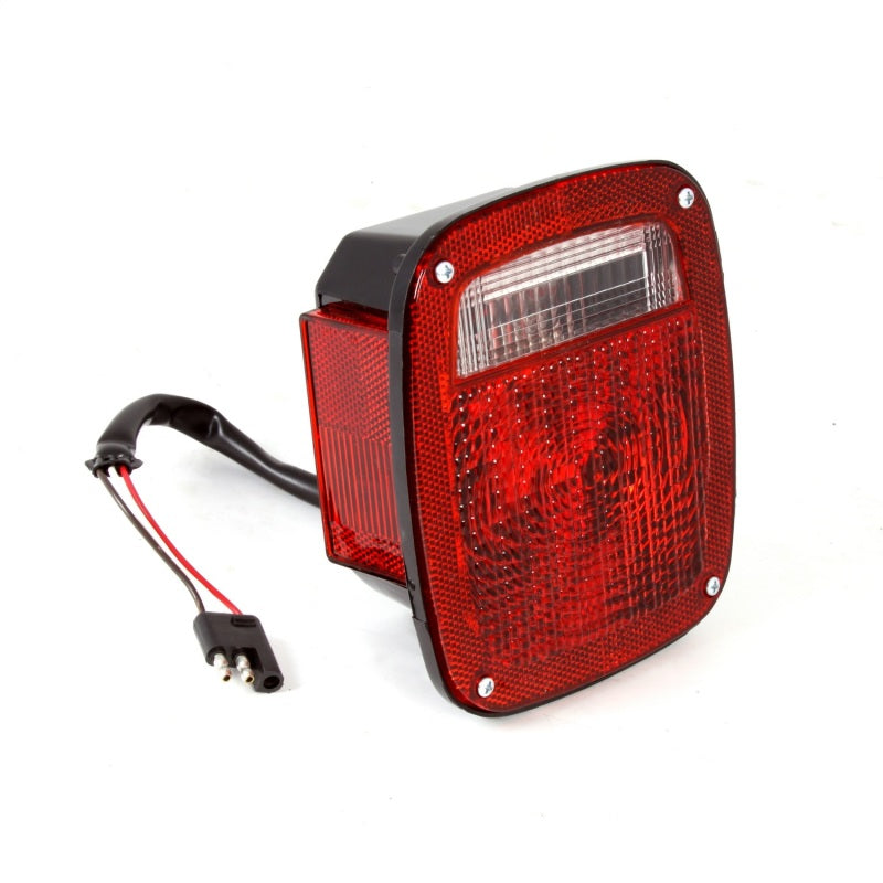 Omix Left Black Tail Lamp 81-86 Jeep CJ Models Omix Left Black Tail Lamp 81-86 Jeep CJ Models
