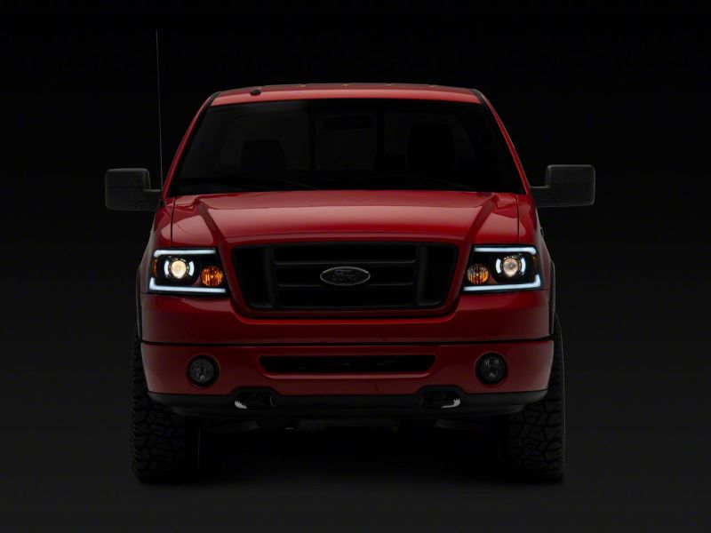 Raxiom 04-08 Ford F-150 Axial Series Projector Headlights w/ SEQL LED Bar- Blk Housing (Clear Lens) Raxiom 04-08 Ford F-150 Axial Series Projector Headlights w/ SEQL LED Bar- Blk Housing (Clear Lens)