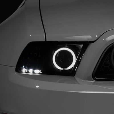 Raxiom 13-14 Ford Mustang w/ Factory HIDLED Halo Projector Headlights- Black Housing (Smoked Lens)