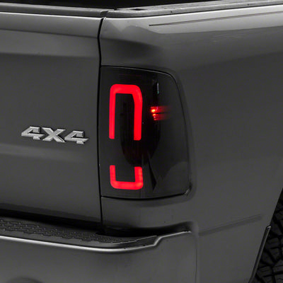 Raxiom 09-18 Dodge RAM 1500/2500/3500 Axial Series LED Tail Lights- Blk Housing (Smoked Lens)