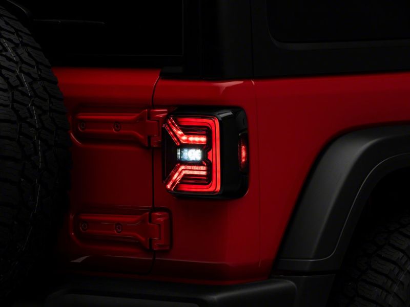 Raxiom 18-23 Jeep Wrangler JL Axial Series LED Tail Lights- Blk Housing (Smoked Lens) Raxiom 18-23 Jeep Wrangler JL Axial Series LED Tail Lights- Blk Housing (Smoked Lens)