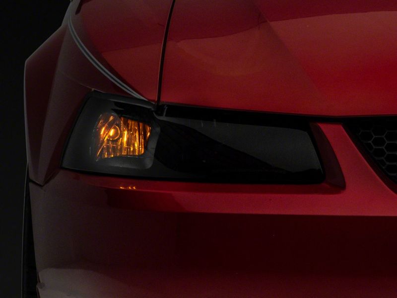 Raxiom 99-04 Ford Mustang Axial Series OEM Style Replacement Headlights- Blk Housing (Smoked Lens) Raxiom 99-04 Ford Mustang Axial Series OEM Style Replacement Headlights- Blk Housing (Smoked Lens)