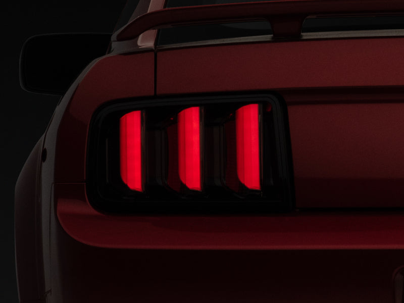 Raxiom 05-09 Ford Mustang Vector V2 LED Tail Lights- Black Housing (Smoked Lens) Raxiom 05-09 Ford Mustang Vector V2 LED Tail Lights- Black Housing (Smoked Lens)