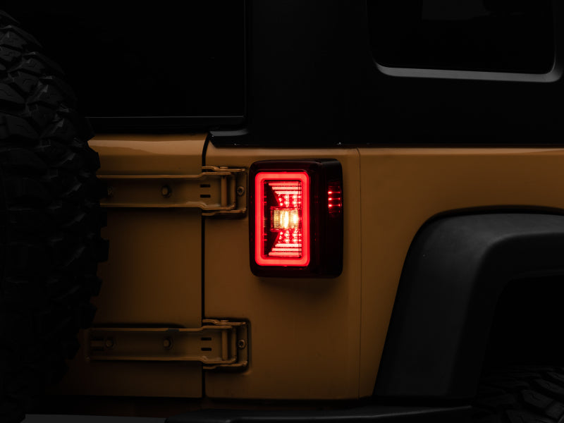 Raxiom 07-18 Jeep Wrangler JK JL Style LED Tail Lights- Black Housing - Red Lens Raxiom 07-18 Jeep Wrangler JK JL Style LED Tail Lights- Black Housing - Red Lens