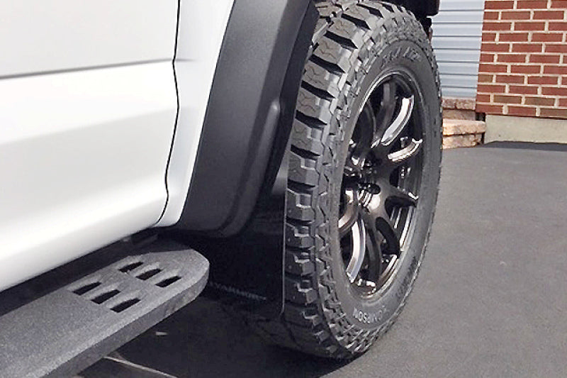 Rally Armor 17-20 Ford F-150 Raptor Gen 2 Black UR Mud Flap w/White Logo Rally Armor 17-20 Ford F-150 Raptor Gen 2 Black UR Mud Flap w/White Logo