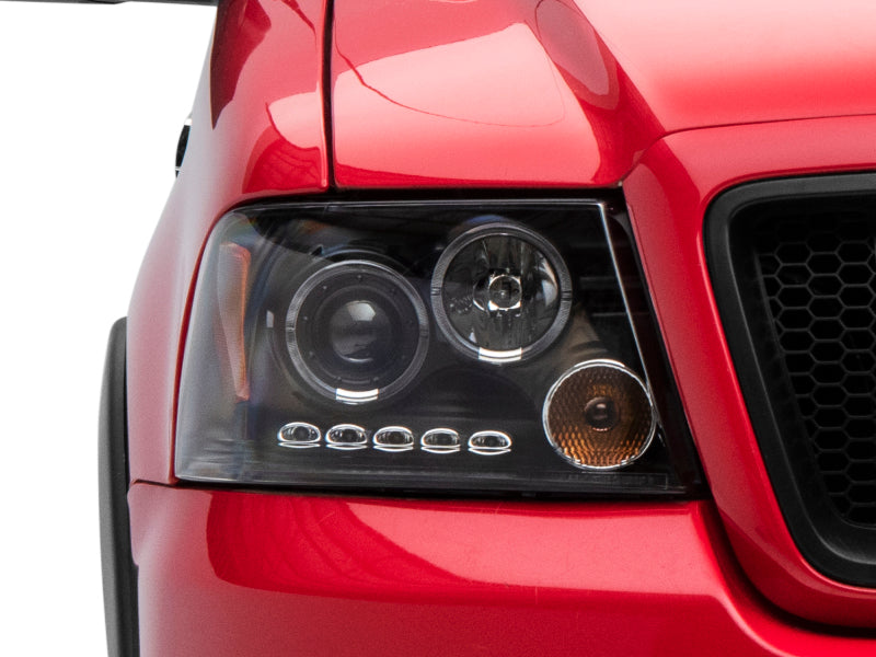 Raxiom 04-08 Ford F-150 Dual LED Halo Projector Headlights- Black Housing (Clear Lens) Raxiom 04-08 Ford F-150 Dual LED Halo Projector Headlights- Black Housing (Clear Lens)