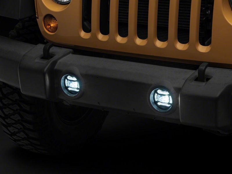 Raxiom 07-18 Jeep Wrangler JK Axial Series 4-In LED Fog Lights- Clear Raxiom 07-18 Jeep Wrangler JK Axial Series 4-In LED Fog Lights- Clear