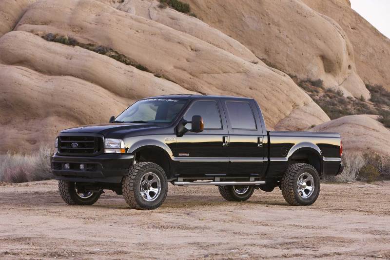 Fabtech 01-04 Ford F250/350 4WD 3.5in Spring Hanger w/Perf Shks Fabtech 01-04 Ford F250/350 4WD 3.5in Spring Hanger w/Perf Shks