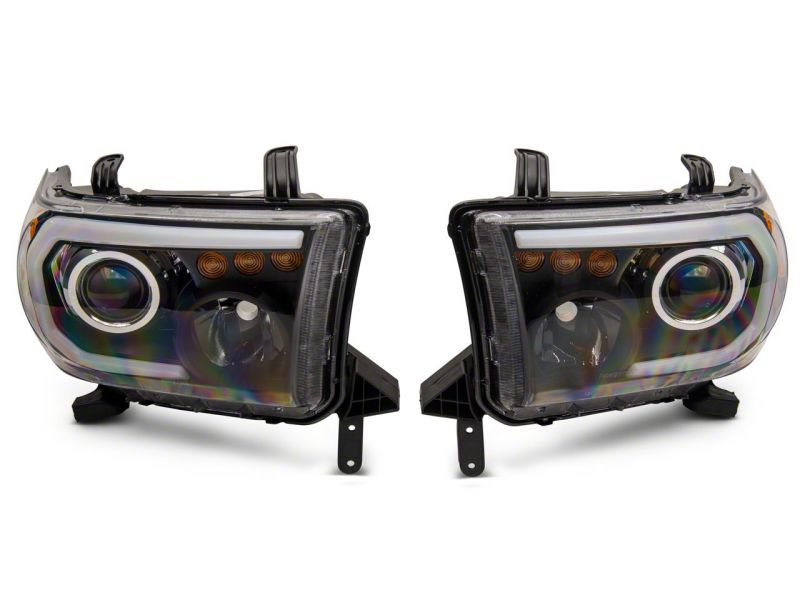 Raxiom 07-13 Toyota Tundra Axial Series Projector Headlights w/ LED Bar- Blk Housing (Clear Lens) Raxiom 07-13 Toyota Tundra Axial Series Projector Headlights w/ LED Bar- Blk Housing (Clear Lens)