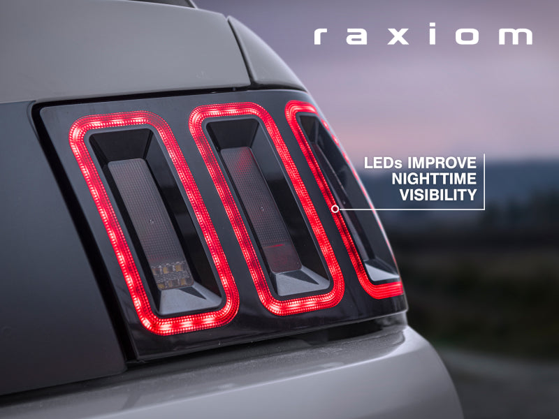 Raxiom 99-04 Ford Mustang Excluding 99-01 Cobra Icon LED Tail Lights- Black Housing (Smoked Lens) Raxiom 99-04 Ford Mustang Excluding 99-01 Cobra Icon LED Tail Lights- Black Housing (Smoked Lens)