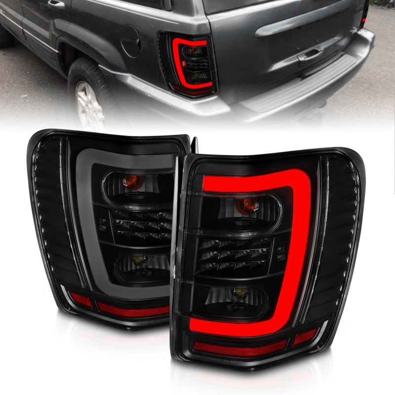 ANZO 1999-2004 Jeep Grand Cherokee LED Tail Lights w/ Light Bar Black Housing Smoke Lens ANZO 1999-2004 Jeep Grand Cherokee LED Tail Lights w/ Light Bar Black Housing Smoke Lens