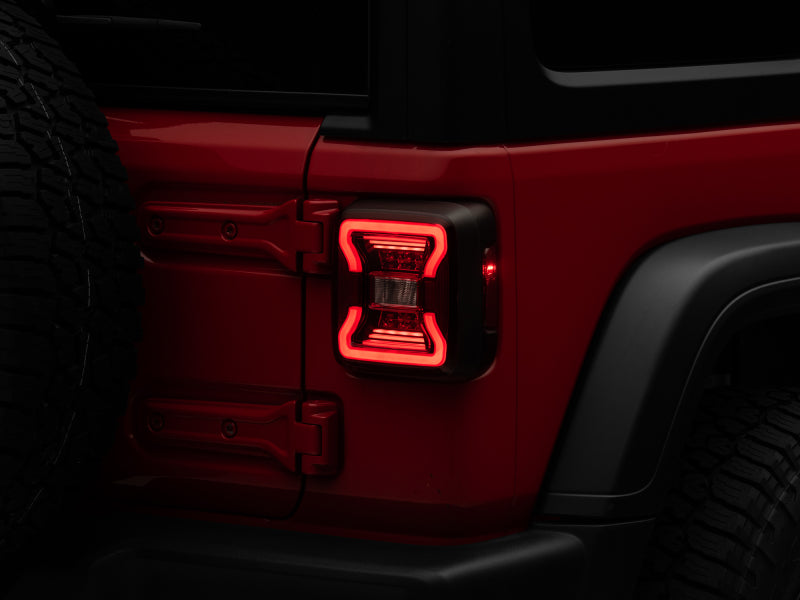 Raxiom 18-22 Jeep Wrangler JL LED Tail Lights- Black Housing - Red Lens Raxiom 18-22 Jeep Wrangler JL LED Tail Lights- Black Housing - Red Lens