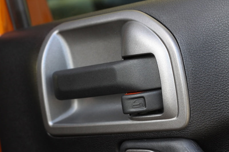 Rugged Ridge 11-18 Jeep Wrangler JK Charcoal Door Latch Trim Rugged Ridge 11-18 Jeep Wrangler JK Charcoal Door Latch Trim