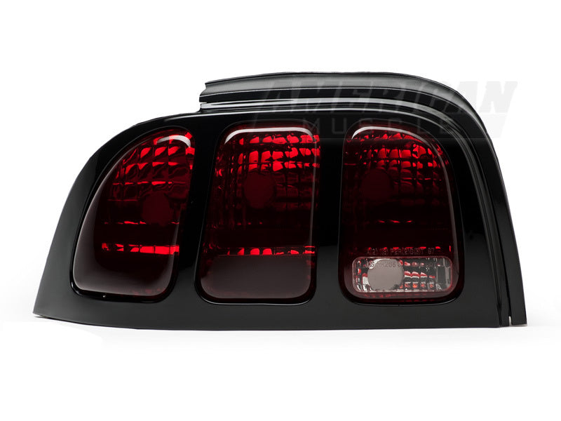 Raxiom 96-98 Ford Mustang Tail Lights- Black Housing (Smoked Lens) Raxiom 96-98 Ford Mustang Tail Lights- Black Housing (Smoked Lens)