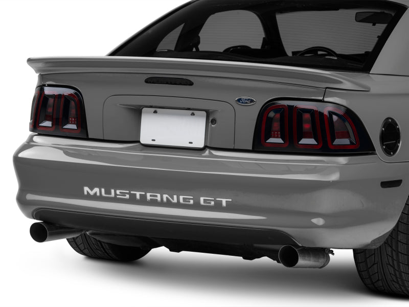 Raxiom 96-98 Ford Mustang Icon LED Tail Lights- Black Housing (Smoked Lens) Raxiom 96-98 Ford Mustang Icon LED Tail Lights- Black Housing (Smoked Lens)