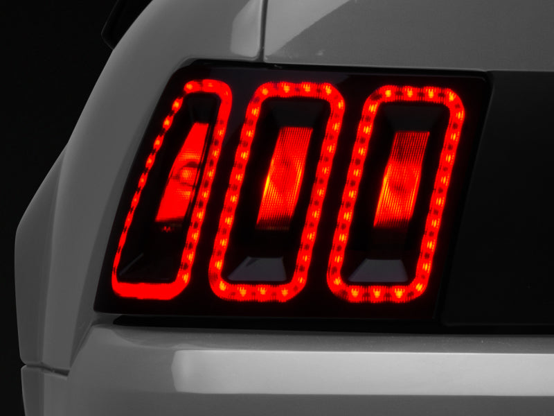 Raxiom 99-04 Ford Mustang Excluding 99-01 Cobra Icon LED Tail Lights- Black Housing (Smoked Lens) Raxiom 99-04 Ford Mustang Excluding 99-01 Cobra Icon LED Tail Lights- Black Housing (Smoked Lens)