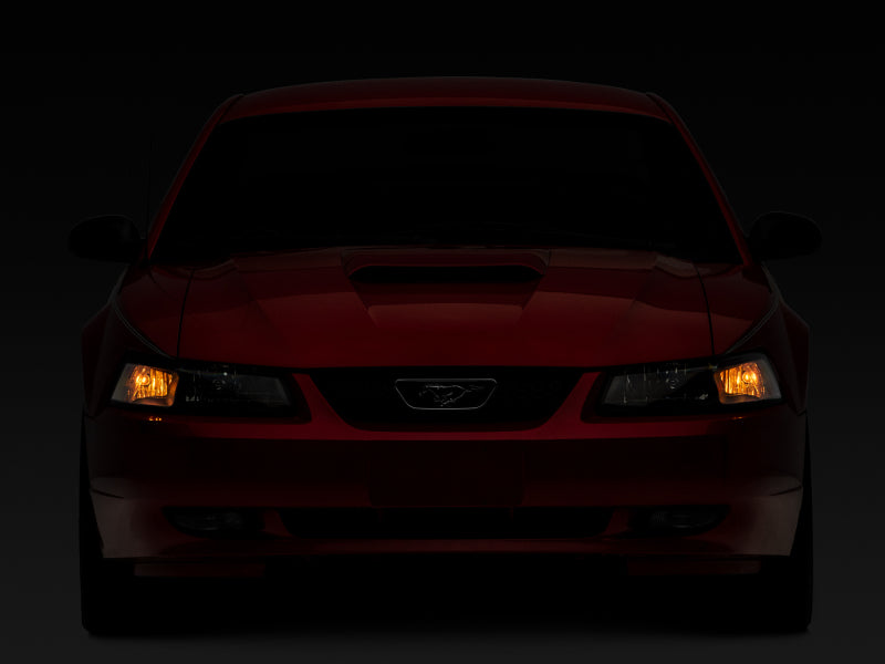 Raxiom 99-04 Mustang Axial Series OEM Style Replacement Headlights- Black Housing (Clear Lens) Raxiom 99-04 Mustang Axial Series OEM Style Replacement Headlights- Black Housing (Clear Lens)