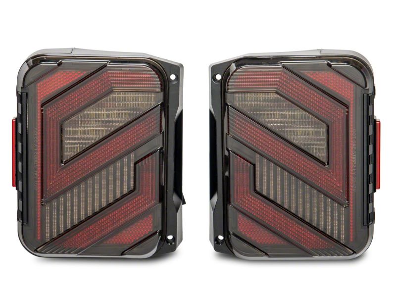Raxiom 07-18 Jeep Wrangler JK Axial Series Trident LED Tail Lights- Blk Housing (Clear Lens) Raxiom 07-18 Jeep Wrangler JK Axial Series Trident LED Tail Lights- Blk Housing (Clear Lens)