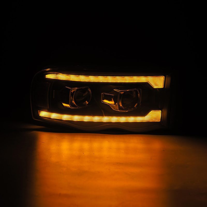 AlphaRex 02-05 Dodge Ram 1500 PRO-Series Projector Headlights Plank Style Black w/Seq Signal AlphaRex 02-05 Dodge Ram 1500 PRO-Series Projector Headlights Plank Style Black w/Seq Signal