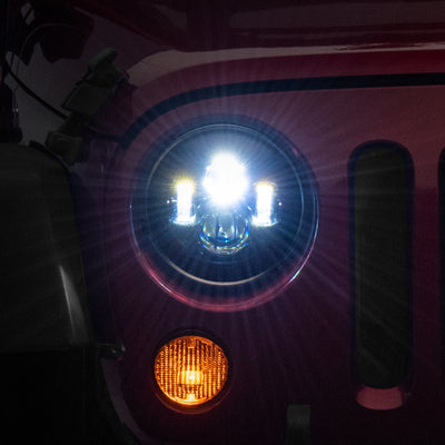 Raxiom 97-18 Jeep Wrangler TJ/JK Axial Series LED Daymaker Headlights- Black Housing (Clear Lens)