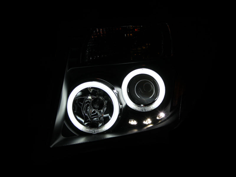 ANZO 2005-2008 Nissan Frontier Projector Headlights w/ Halo Black ANZO 2005-2008 Nissan Frontier Projector Headlights w/ Halo Black