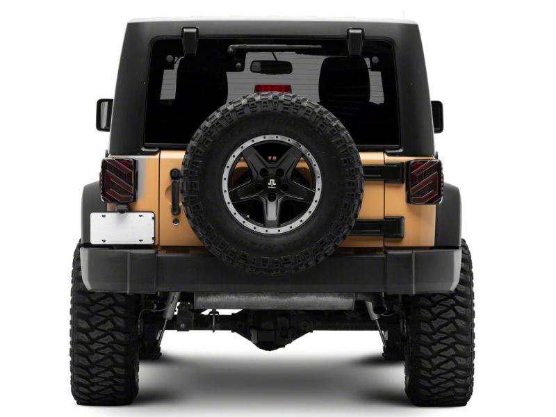 Raxiom 07-18 Jeep Wrangler JK Axial Series Trident LED Tail Lights- Blk Housing (Clear Lens) Raxiom 07-18 Jeep Wrangler JK Axial Series Trident LED Tail Lights- Blk Housing (Clear Lens)