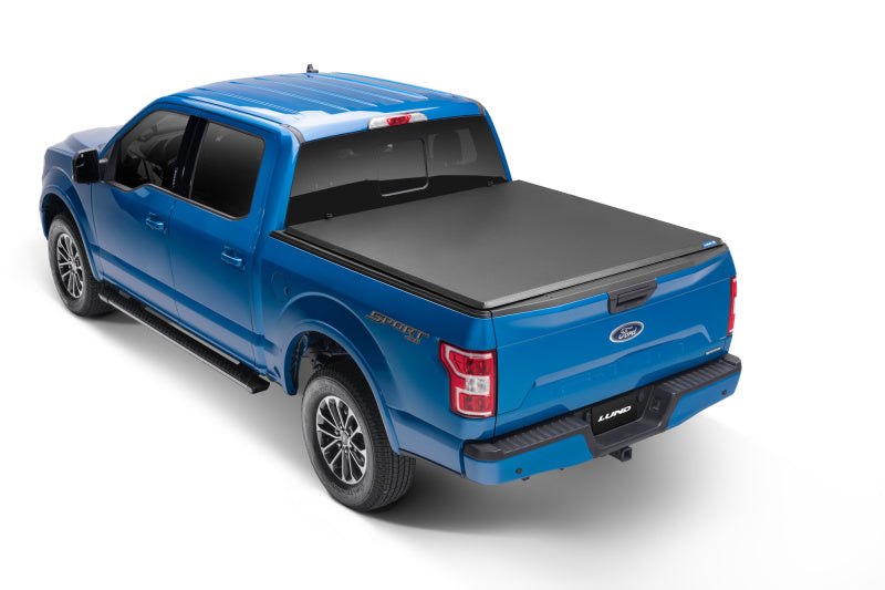 Lund 02-17 Dodge Ram 1500 Fleetside (6.4ft. Bed) Hard Fold Tonneau Cover - Black Lund 02-17 Dodge Ram 1500 Fleetside (6.4ft. Bed) Hard Fold Tonneau Cover - Black