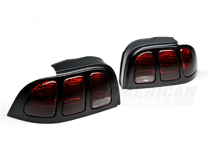Raxiom 96-98 Ford Mustang Tail Lights- Black Housing (Smoked Lens) Raxiom 96-98 Ford Mustang Tail Lights- Black Housing (Smoked Lens)