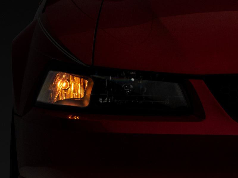 Raxiom 99-04 Mustang Axial Series OEM Style Replacement Headlights- Black Housing (Clear Lens) Raxiom 99-04 Mustang Axial Series OEM Style Replacement Headlights- Black Housing (Clear Lens)