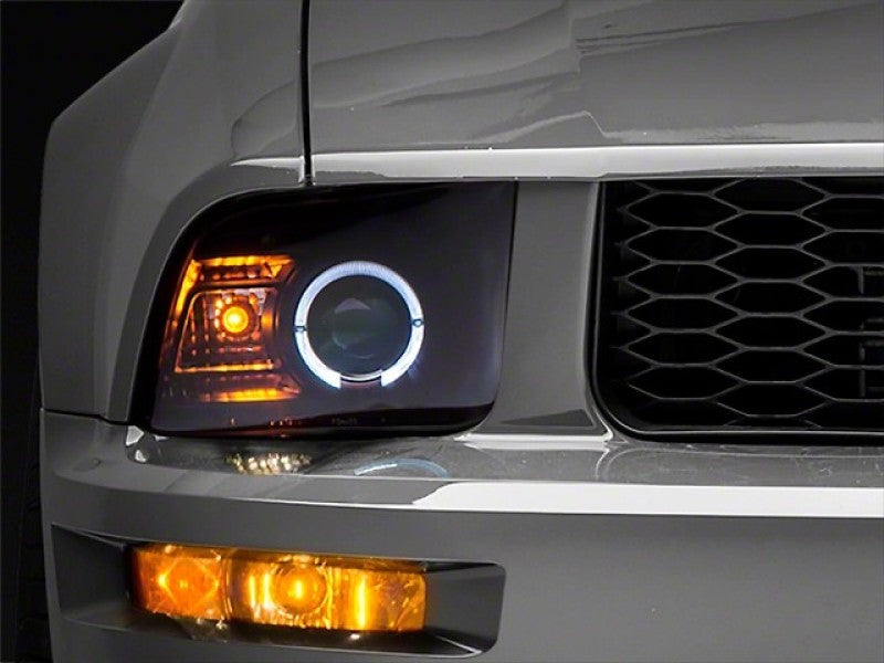 Raxiom 05-09 Ford Mustang Halogen 2010 Style LED Halo Headlights-Blk Hsng(Clear Lens/Excludes GT500) Raxiom 05-09 Ford Mustang Halogen 2010 Style LED Halo Headlights-Blk Hsng(Clear Lens/Excludes GT500)