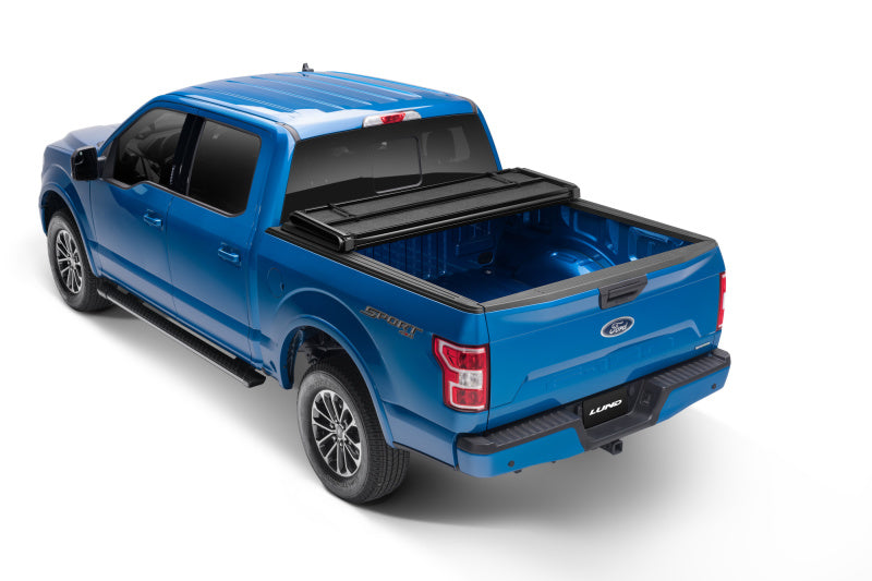 Lund 02-17 Dodge Ram 1500 Fleetside (6.4ft. Bed) Hard Fold Tonneau Cover - Black Lund 02-17 Dodge Ram 1500 Fleetside (6.4ft. Bed) Hard Fold Tonneau Cover - Black