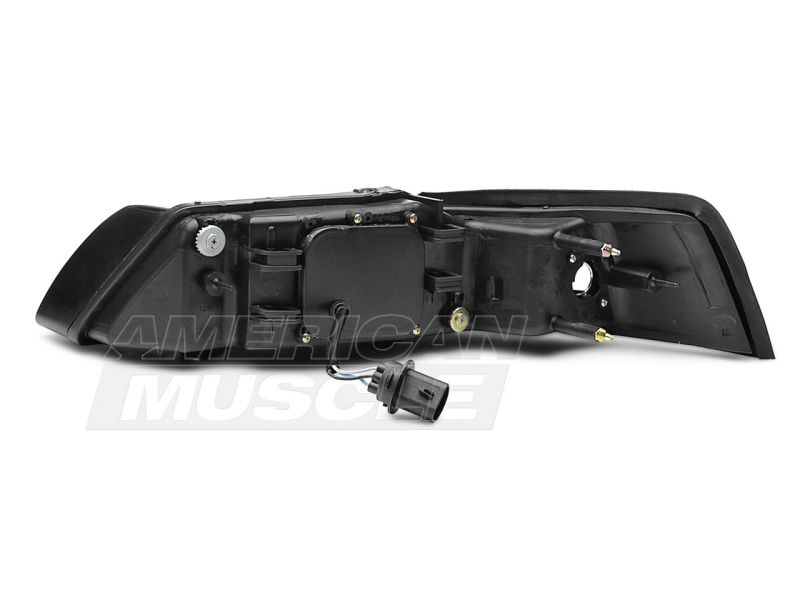 Raxiom 99-04 Ford Mustang Axial Series Projector Headlights- Blk Housing (Smoked Lens) Raxiom 99-04 Ford Mustang Axial Series Projector Headlights- Blk Housing (Smoked Lens)