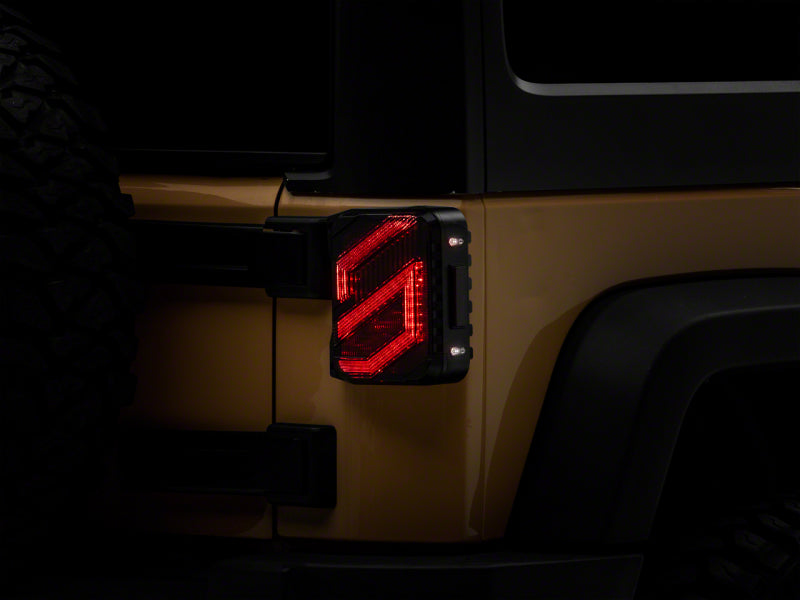 Raxiom 07-18 Jeep Wrangler JK Axial Series Trident LED Tail Lights- Blk Housing (Smoked Lens) Raxiom 07-18 Jeep Wrangler JK Axial Series Trident LED Tail Lights- Blk Housing (Smoked Lens)