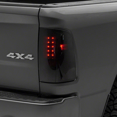 Raxiom 09-18 Dodge RAM 1500/2500/3500 Axial Series LED Tail Lights- BlkHousing- SmokedLens