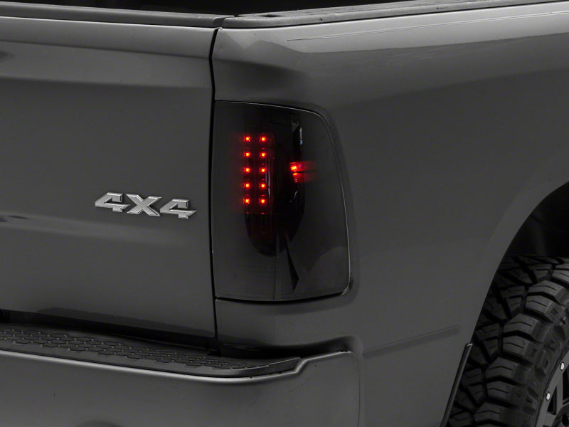 Raxiom 09-18 Dodge RAM 1500/2500/3500 Axial Series LED Tail Lights- BlkHousing- SmokedLens Raxiom 09-18 Dodge RAM 1500/2500/3500 Axial Series LED Tail Lights- BlkHousing- SmokedLens