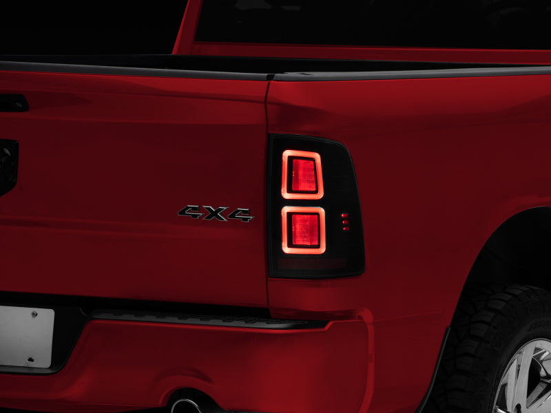 Raxiom 09-18 Dodge RAM 1500 LED Tail Lights- Black Housing (Smoked Lens) Raxiom 09-18 Dodge RAM 1500 LED Tail Lights- Black Housing (Smoked Lens)