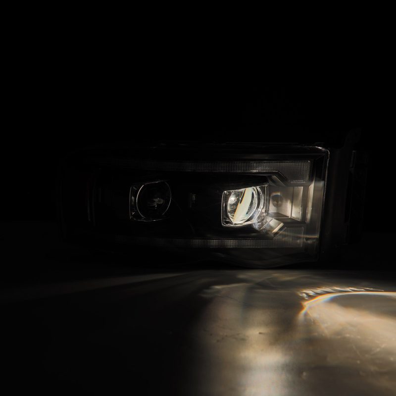 AlphaRex 02-05 Dodge Ram 1500 PRO-Series Projector Headlights Plank Style Chrome w/Seq Signal AlphaRex 02-05 Dodge Ram 1500 PRO-Series Projector Headlights Plank Style Chrome w/Seq Signal