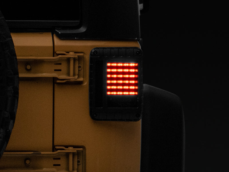 Raxiom 07-18 Jeep Wrangler JK LED Tail Lights- Black Housing (Smoked Lens) Raxiom 07-18 Jeep Wrangler JK LED Tail Lights- Black Housing (Smoked Lens)