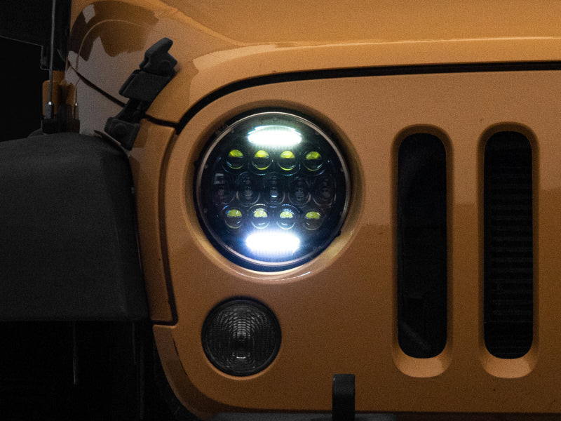 Raxiom 97-18 Jeep Wrangler TJ/JK Axial Series 13-LED Headlights- Black Housing (Clear Lens) Raxiom 97-18 Jeep Wrangler TJ/JK Axial Series 13-LED Headlights- Black Housing (Clear Lens)