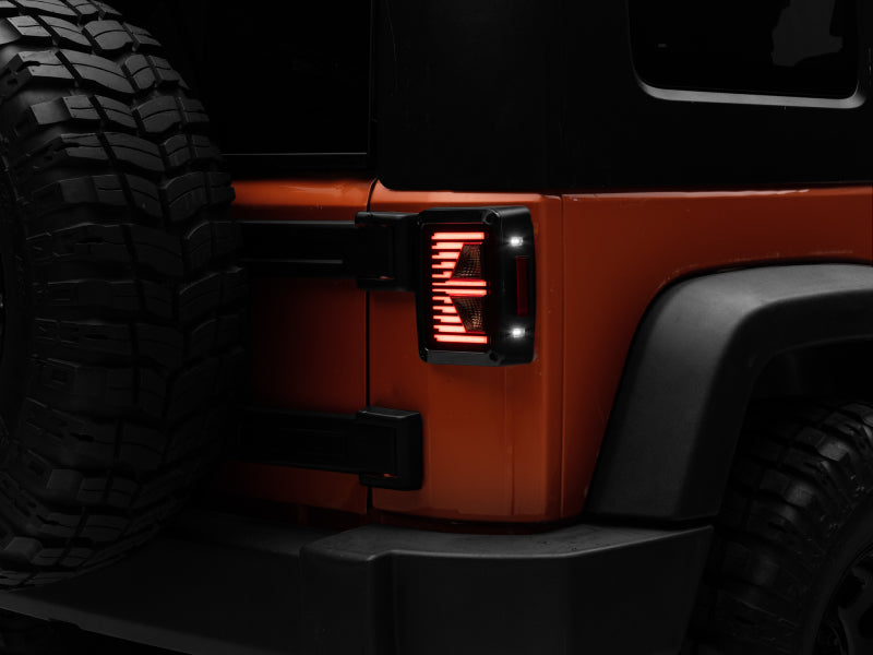 Raxiom 07-18 Jeep Wrangler JK Axial Series Vision LED Tail Lights- Black Housing (Smoked Lens) Raxiom 07-18 Jeep Wrangler JK Axial Series Vision LED Tail Lights- Black Housing (Smoked Lens)