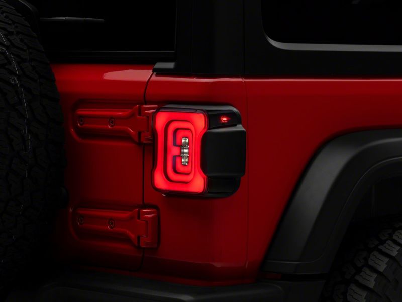 Raxiom 18-23 Jeep Wrangler JL Axial Series Carver LED Tail Lights- Blk Housing (Smoked Lens) Raxiom 18-23 Jeep Wrangler JL Axial Series Carver LED Tail Lights- Blk Housing (Smoked Lens)