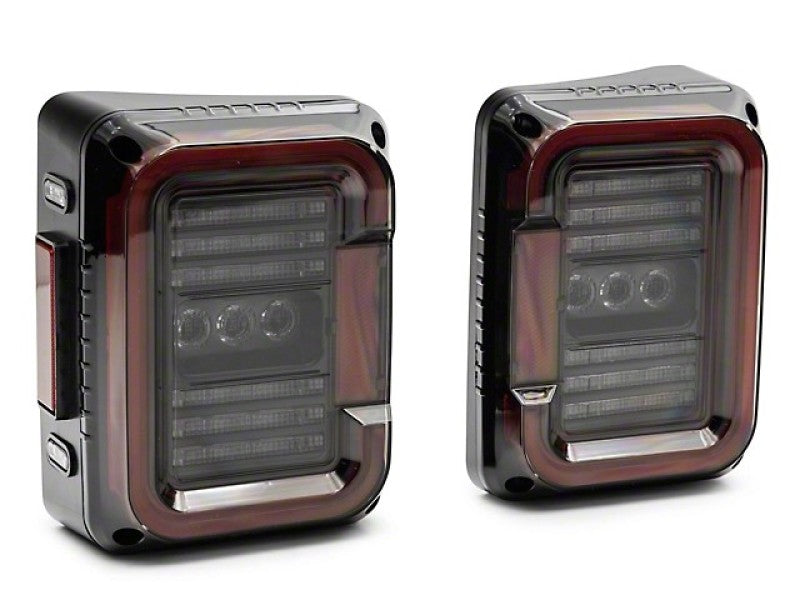 Raxiom 07-18 Jeep Wrangler JK Axial Series LED Halo Tail Lights- Black Housing (Dark Smoked Lens) Raxiom 07-18 Jeep Wrangler JK Axial Series LED Halo Tail Lights- Black Housing (Dark Smoked Lens)