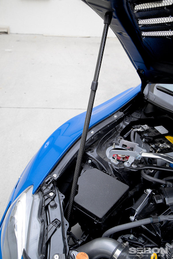 Seibon Universal Carbon Fiber Hood/Truck Prop Seibon Universal Carbon Fiber Hood/Truck Prop