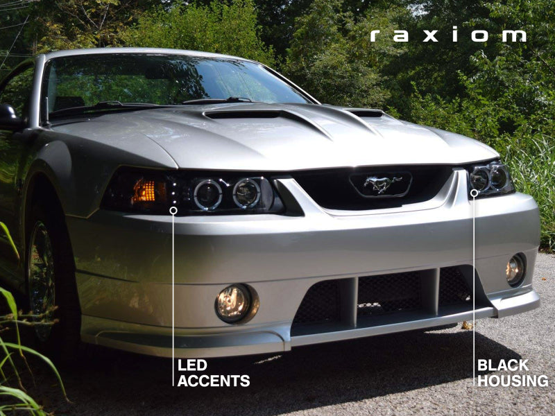 Raxiom 99-04 Ford Mustang Dual LED Halo Projector Headlights- Black Housing (Clear Lens) Raxiom 99-04 Ford Mustang Dual LED Halo Projector Headlights- Black Housing (Clear Lens)